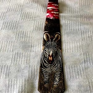 Intriguing animal print tie. Lots of complements.